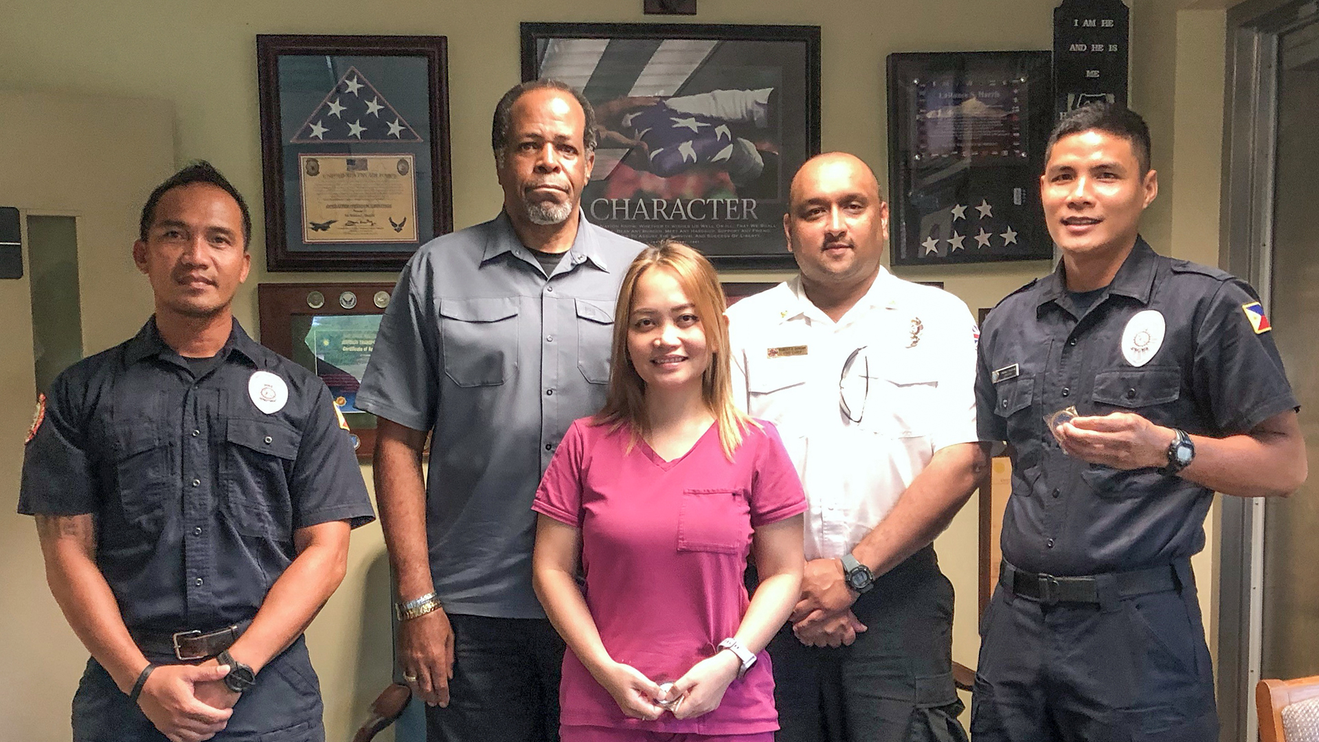 KBR Firefighters And Nurse Receive Recognition Coins For Life Saving Actions