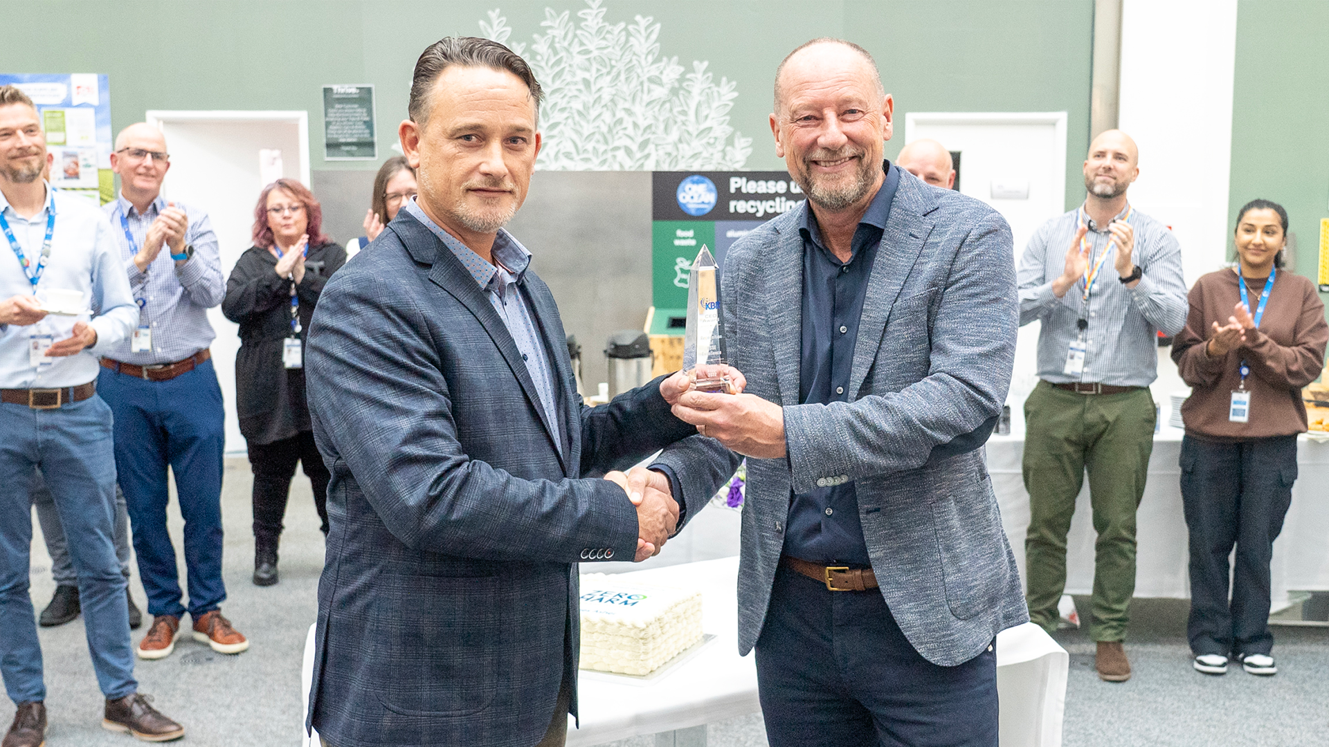 Stuart Bradie presents KBR CEO HSSE Excellence Award to winner James Asher